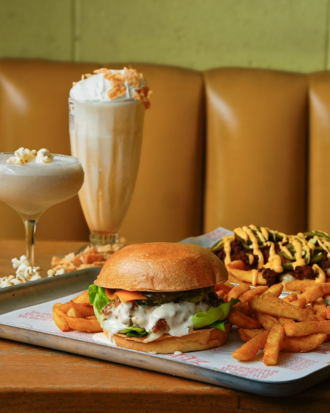 The October 2026 specials at His Boy Elroy: The Pickler burger, Sloppy Joe loaded fries, Frosty Flake Shake and Popcorn Palooza