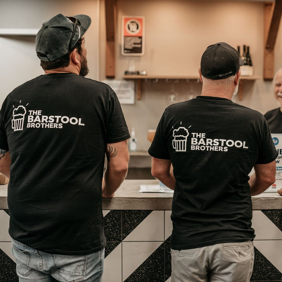 Barstool Brothers in their team shirts at the His Boy Elroy bar