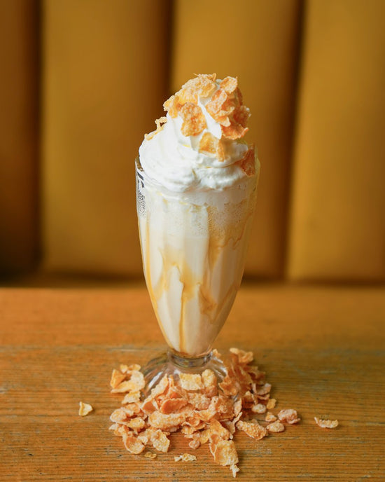 Frosty Flake Shake topped with whipped cream and Frosty Flakes, His Boy Elroy October 2026 special